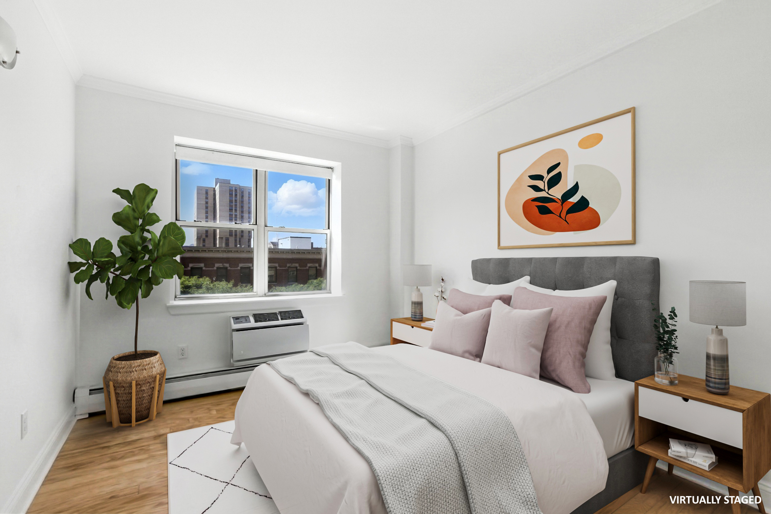 1787 Madison Avenue, Unit 402 Manhattan, NY 10035 - Photo 4 of 13 a bedroom with bed and a potted plant