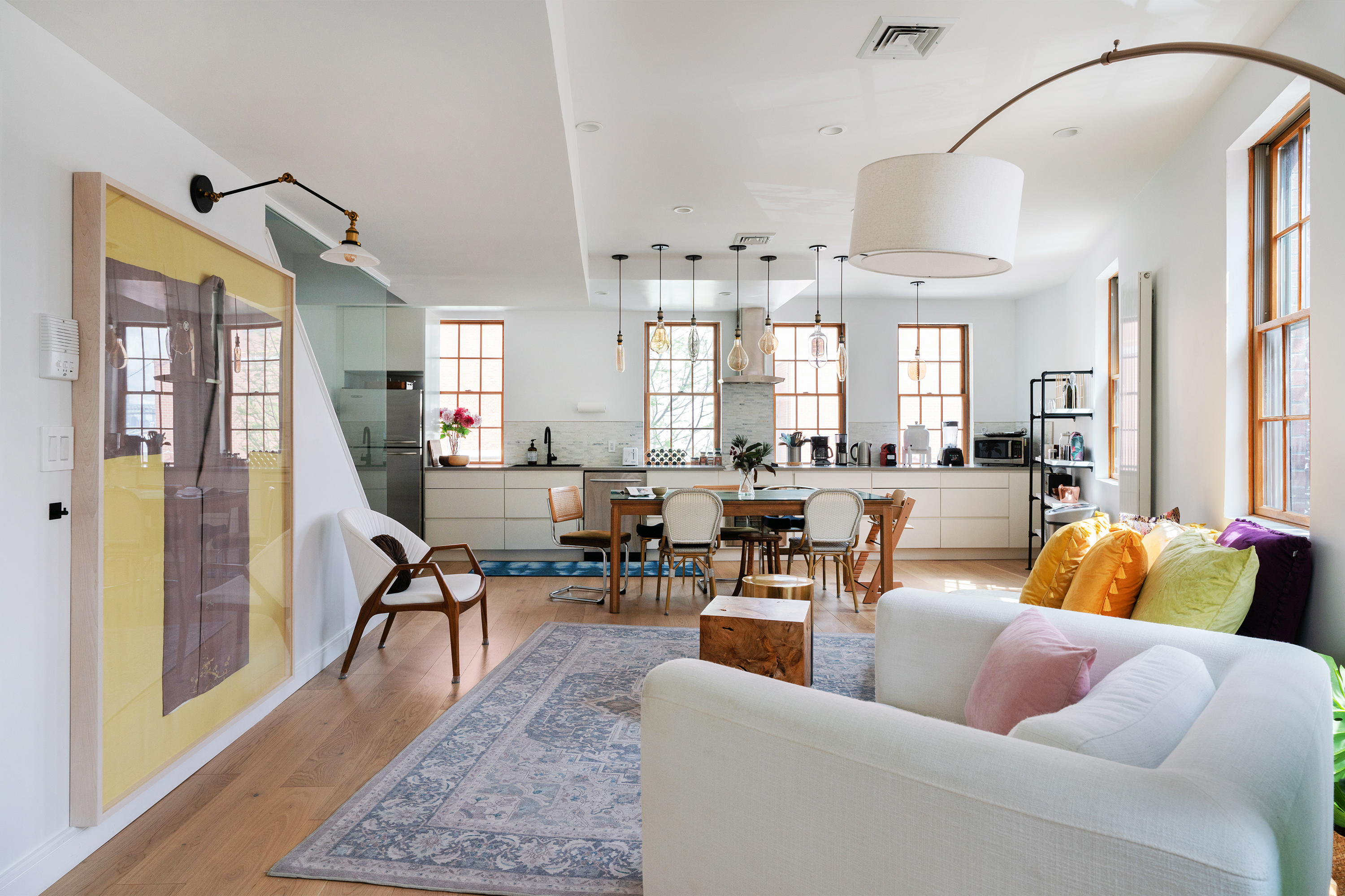 334 Plymouth Street Brooklyn, NY 11201 - Photo 5 of 32 a living room with furniture potted plant and open kitchen view
