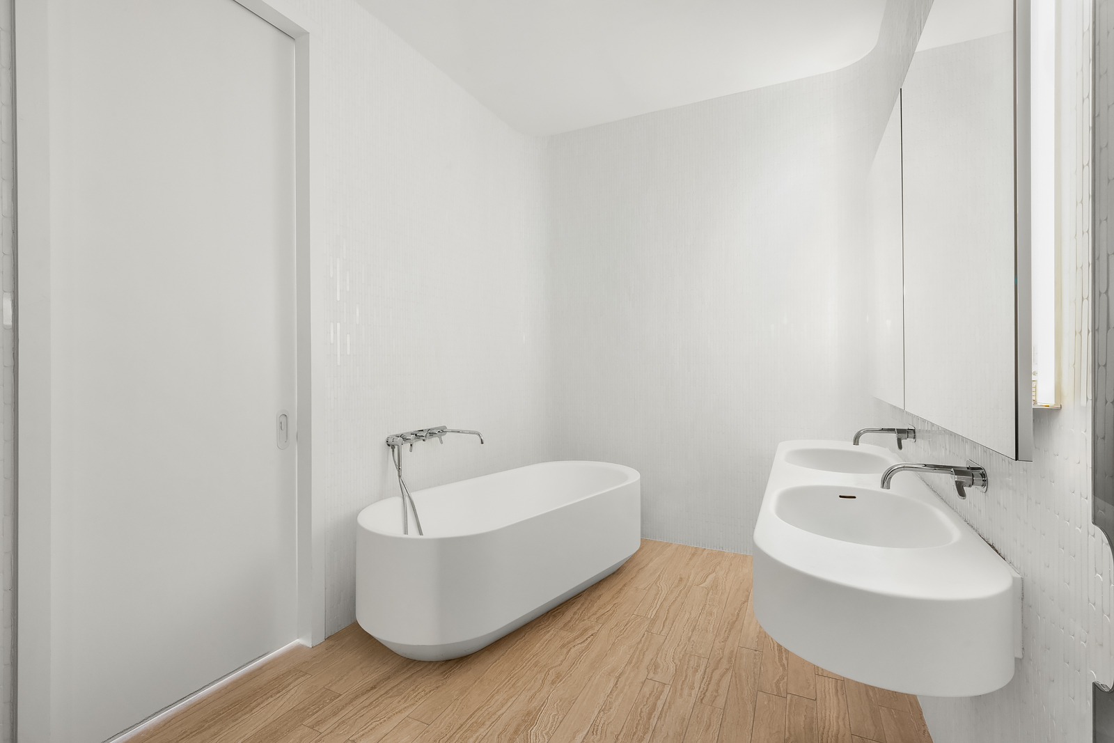 56 Leonard Street, Unit 39BEAST Manhattan, NY 10013 - Photo 13 of 18 a bathroom with a sink and bathtub