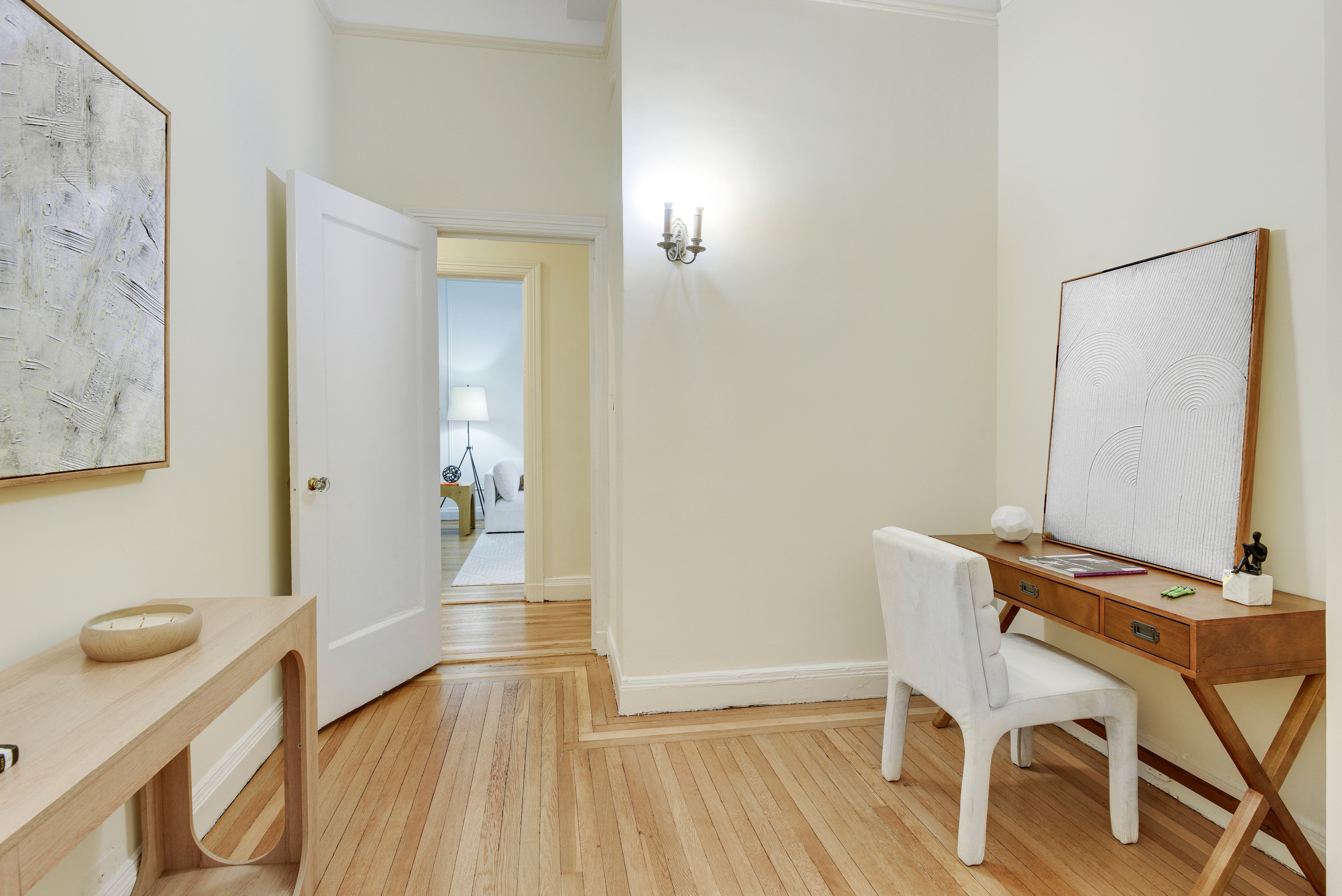 1349 Lexington Avenue, Unit 1F Manhattan, NY 10128 - Photo 6 of 16 a view of a livingroom with furniture and wooden floor
