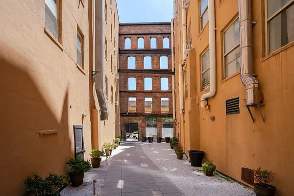 275 Park Avenue, Unit 2HH Brooklyn, NY 11205 - Photo 9 of 11 a view of a building with a street