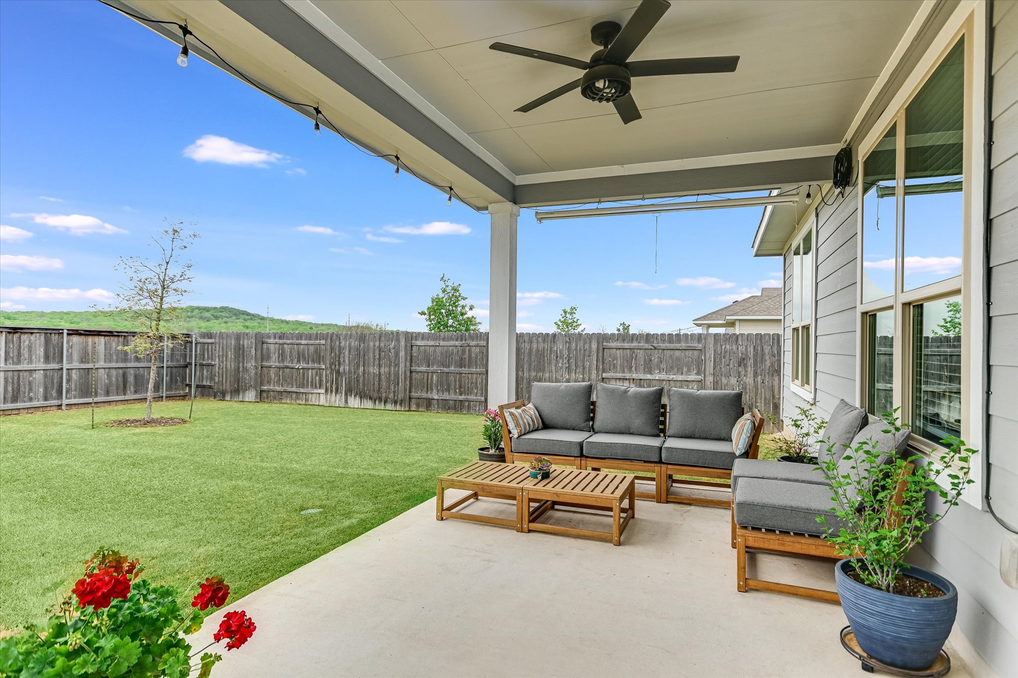8607 McKamy Drive Austin, TX 78744 - Photo 22 of 28 a outdoor living space with furniture and garden view