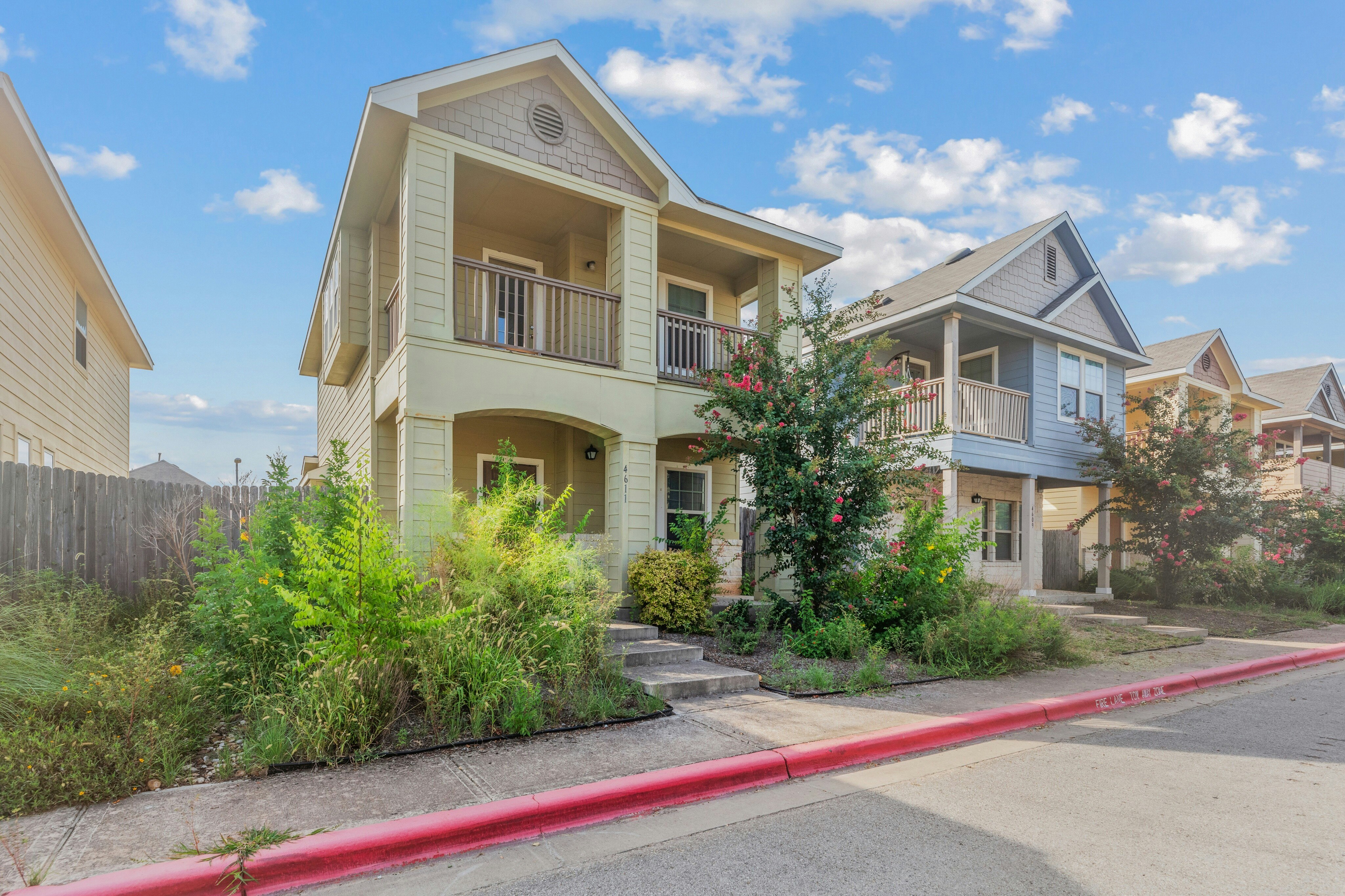 4611 Esper Lane, Unit 324 Austin, TX 78725 - Photo 1 of 10 a front view of house with yard
