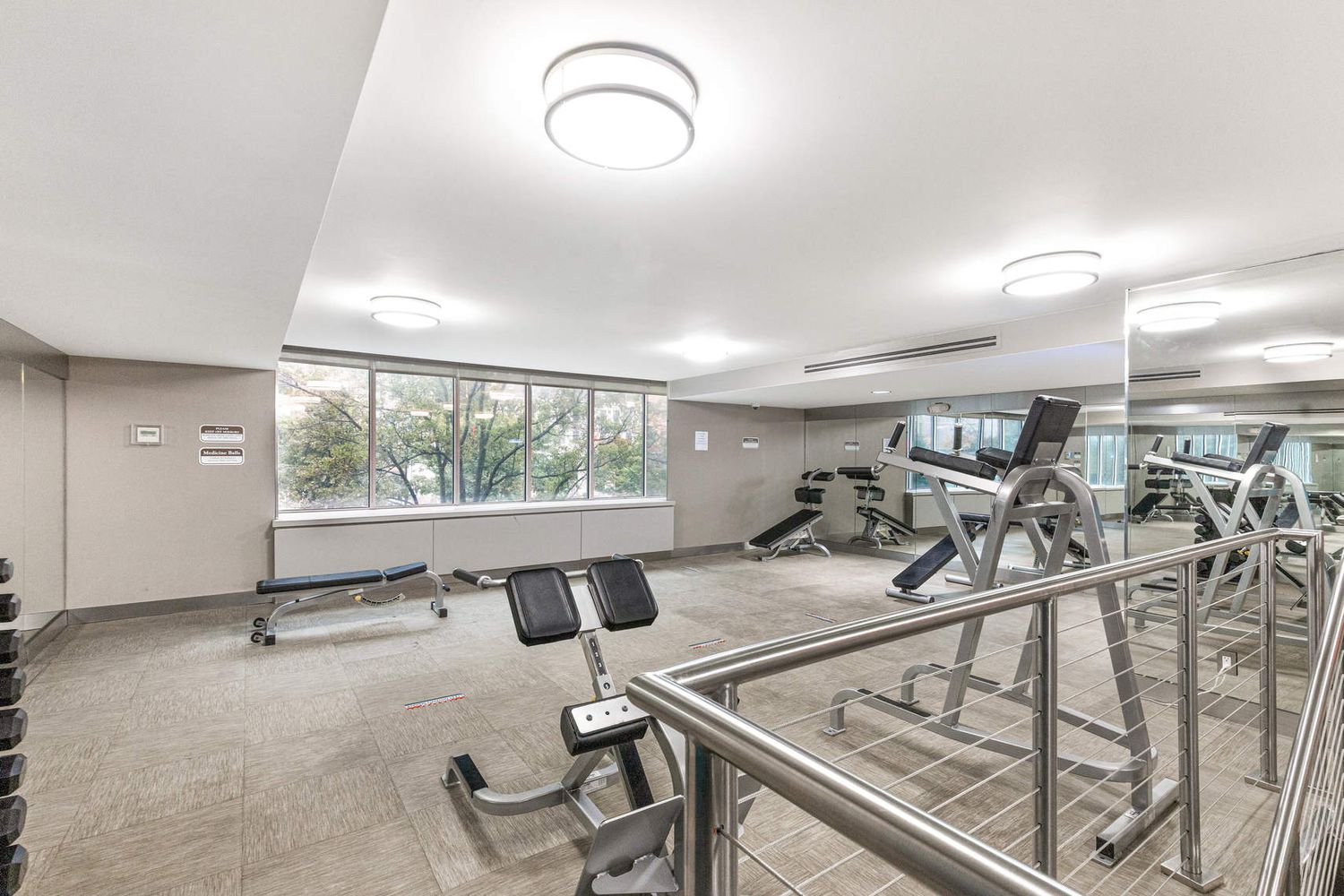 225 Rector Place, Unit 7M Manhattan, NY 10280 - Photo 9 of 13 a view of a room with gym equipment
