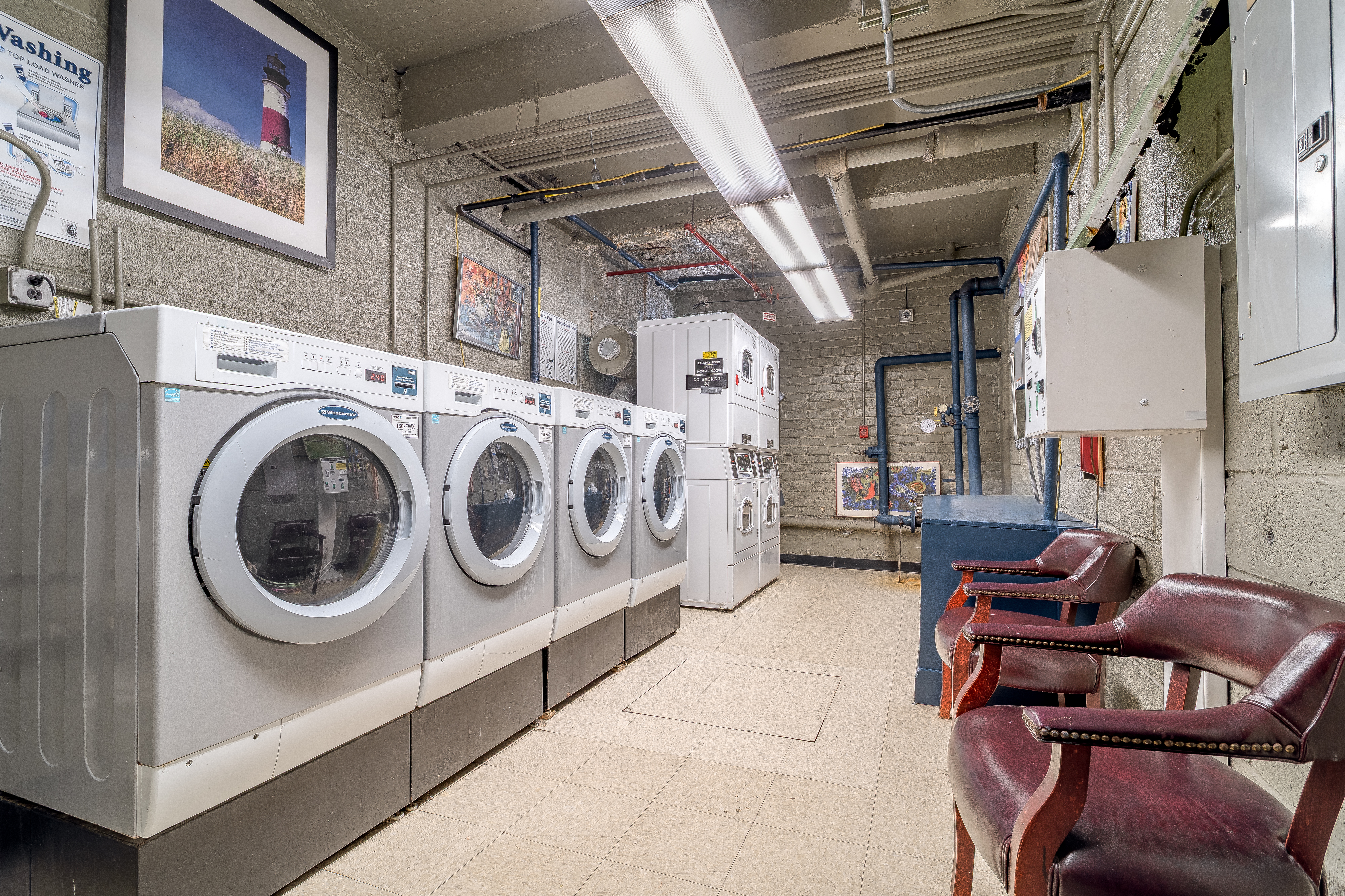 1420 York Avenue, Unit 6J Manhattan, NY 10021 - Photo 12 of 13 a utility room with dryer and washer