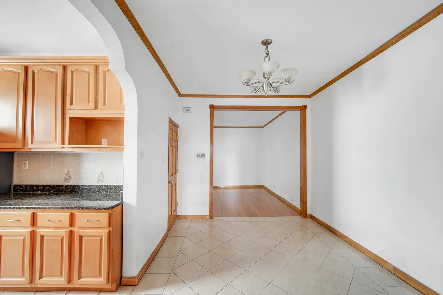 a view of entryway with chandelier