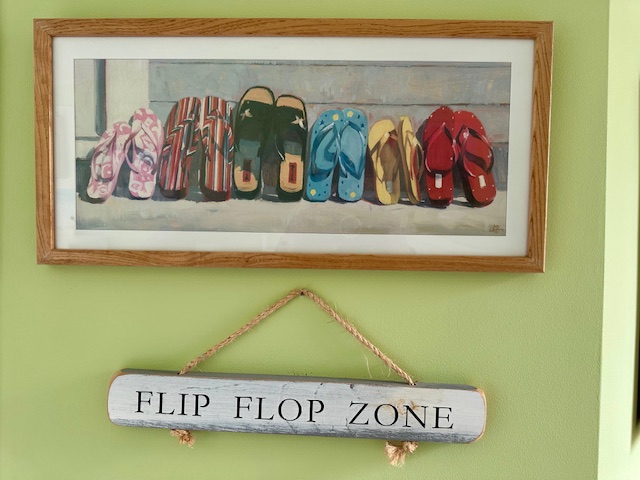 11 Juniper Circle Brewster, MA 02631 - Photo 10 of 29 a view of a wall with clothes and shoes