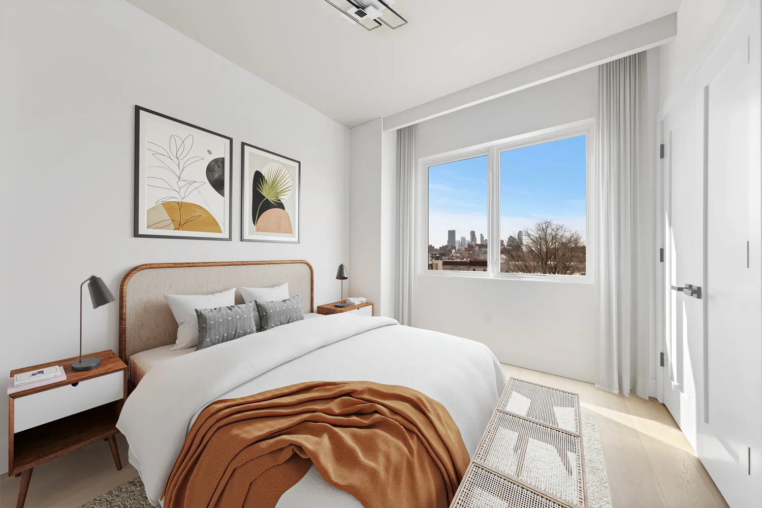 a bedroom with a bed and a painting on the wall