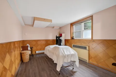 a bed room with a bed and a couch