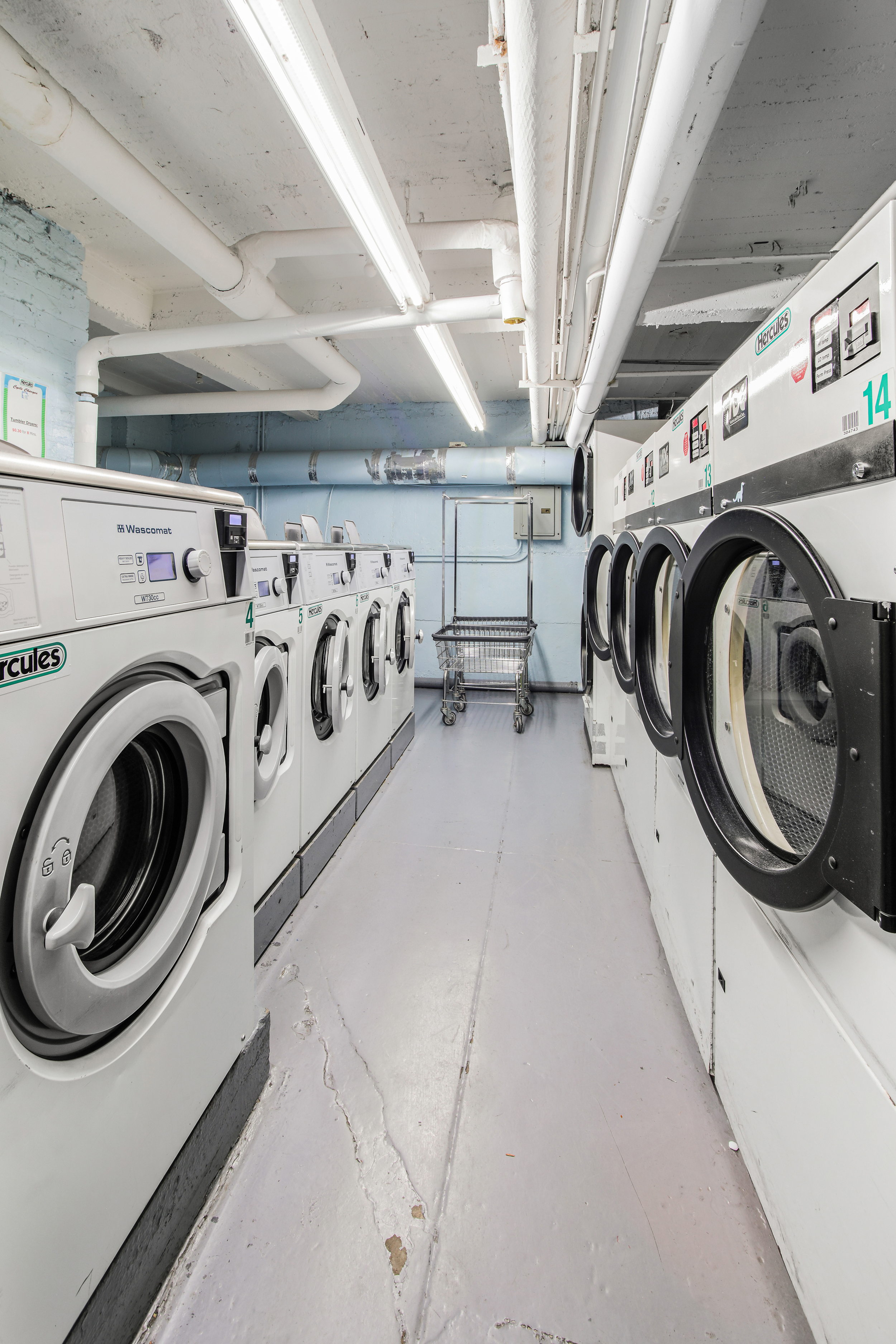 657 East 26th Street, Unit 3G Brooklyn, NY 11210 - Photo 12 of 14 a utility room with dryer and washer