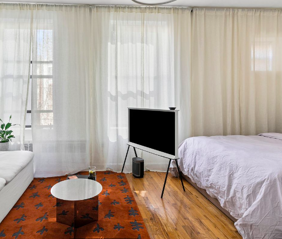 10 Fort Greene Place Brooklyn, NY 11217 - Photo 4 of 15 a bedroom with furniture and a fireplace