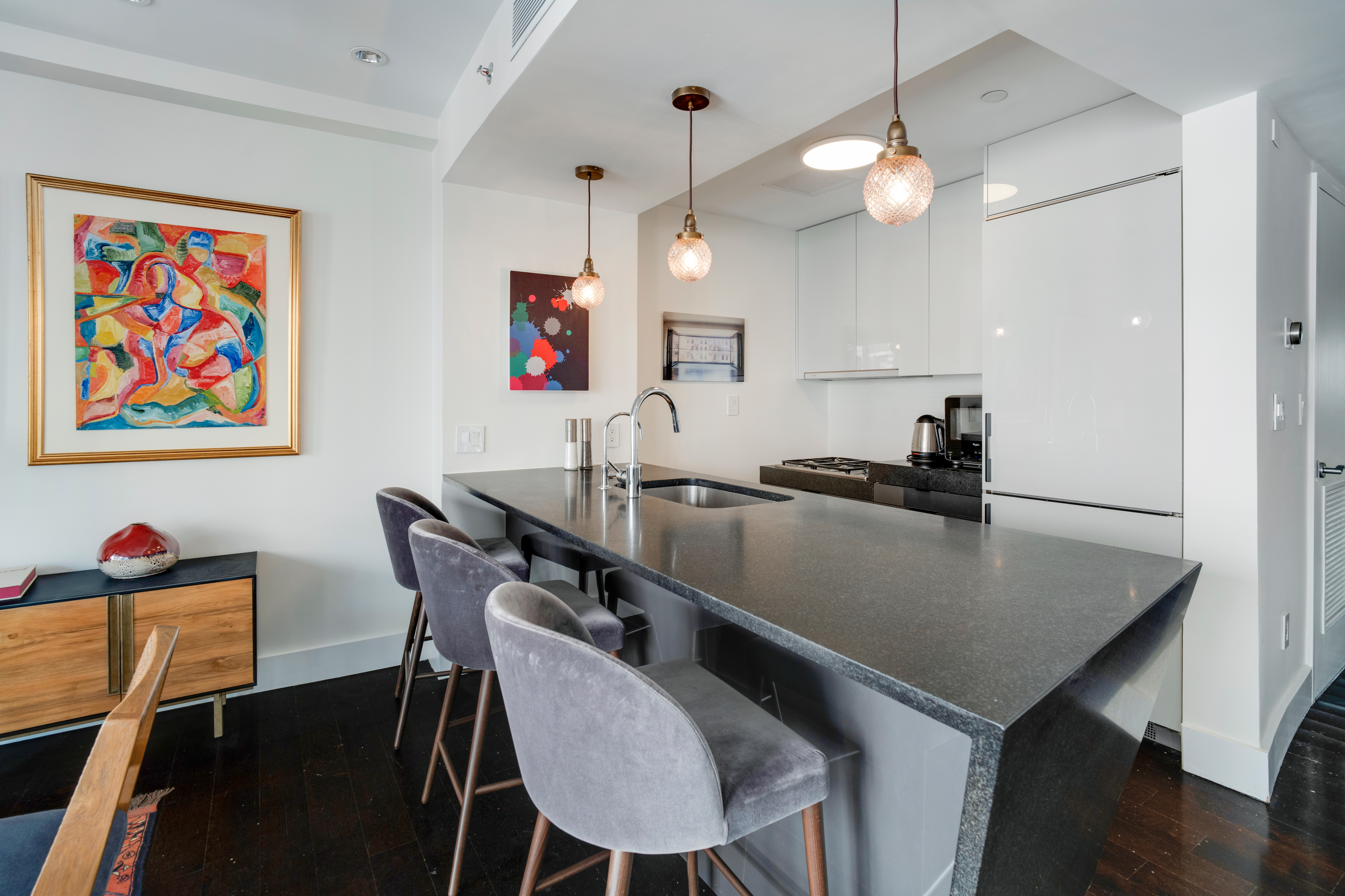 60 Orchard Street, Unit 4 Manhattan, NY 10002 - Photo 3 of 18 a view of a dining room with furniture and wooden floor