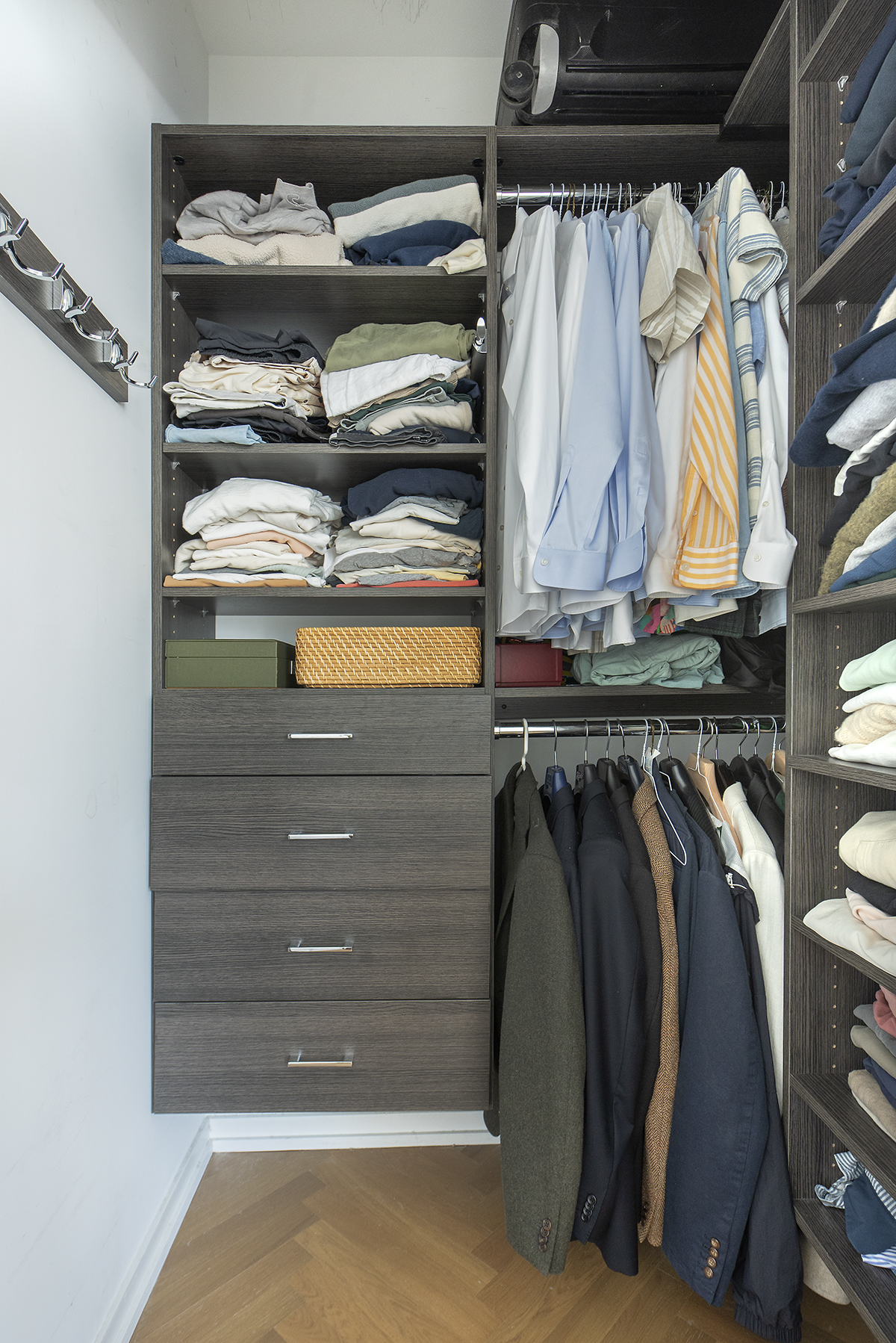 184 Kent Avenue, Unit D519 Brooklyn, NY 11249 - Photo 6 of 17 a view of walk in closet with clothes and shoes