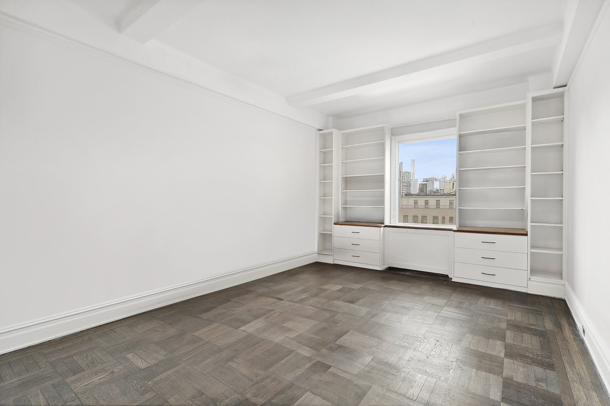 215 West 92nd Street, Unit 15A Manhattan, NY 10025 - Photo 10 of 14 an empty room with windows