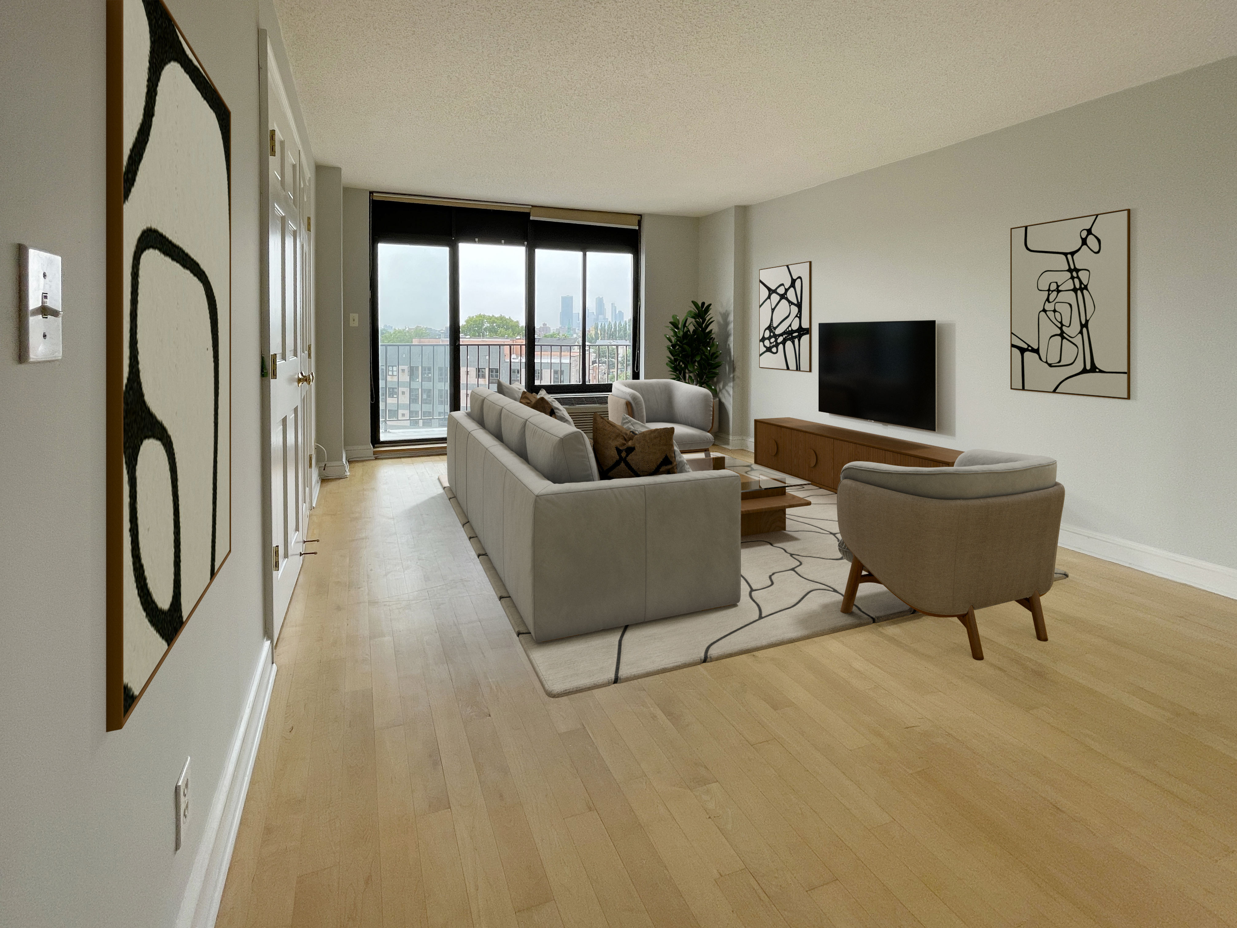 a living room with furniture and a flat screen tv