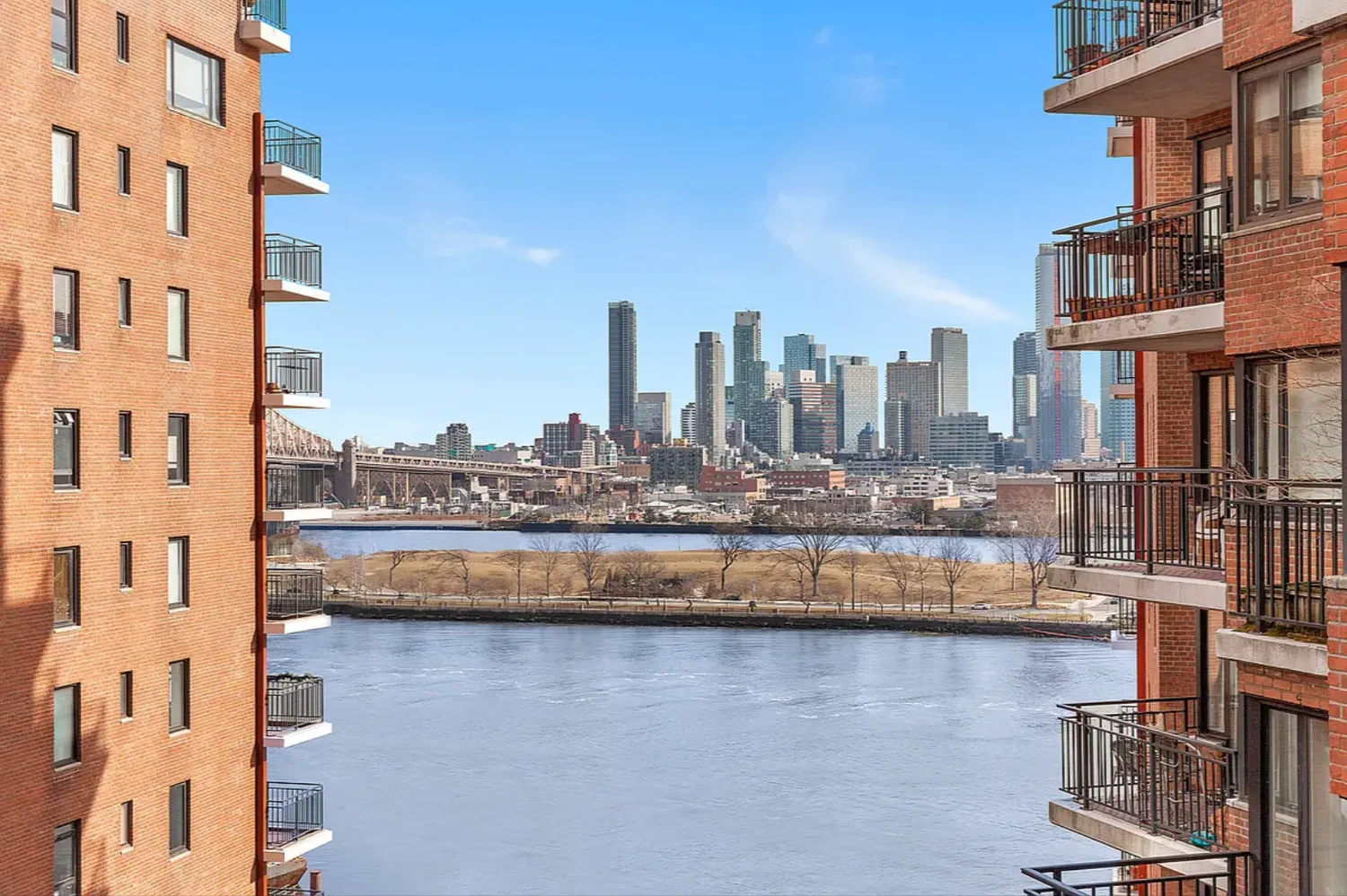 a view of a city with tall buildings