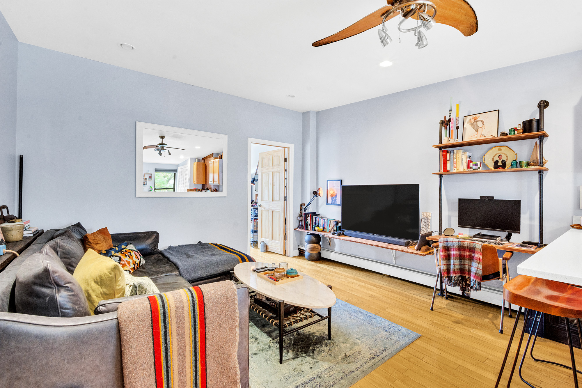 10 Carroll Street Brooklyn, NY 11231 - Photo 19 of 28 a living room with furniture and a flat screen tv