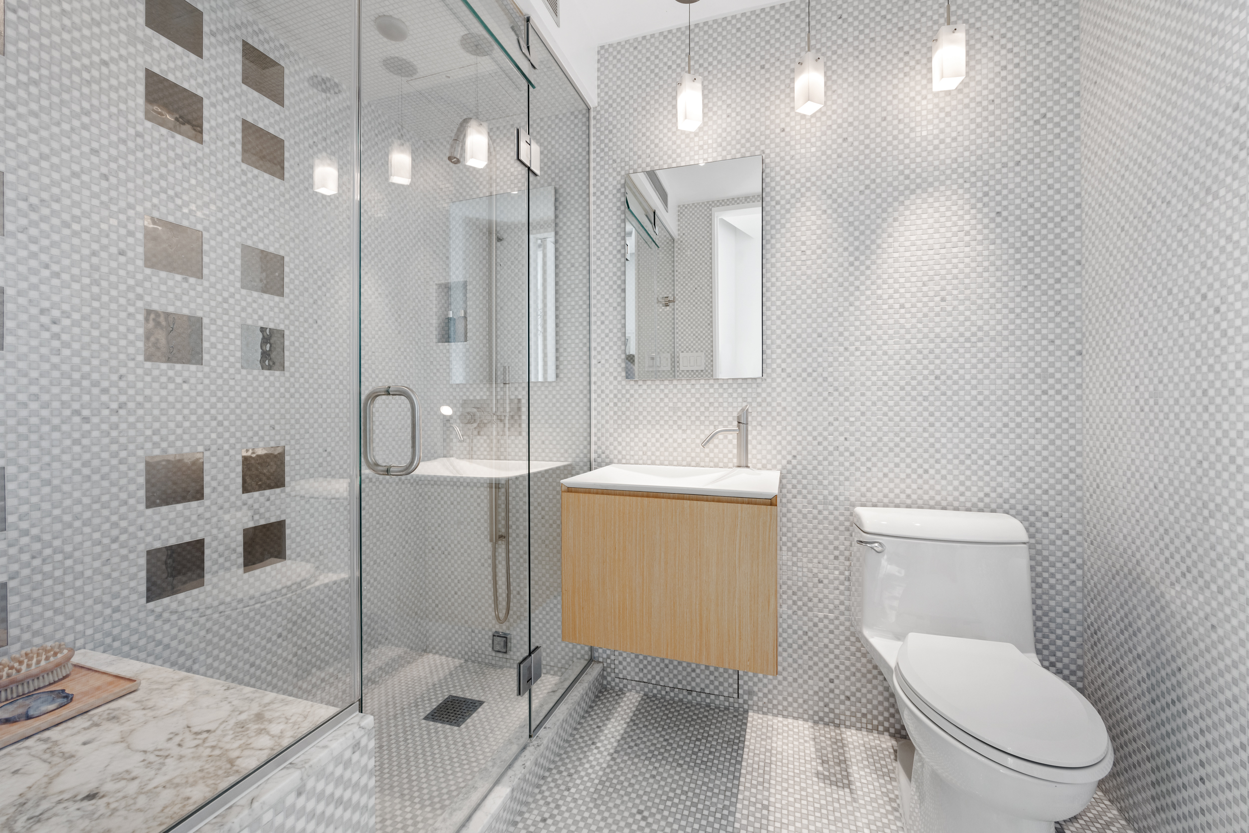 200 Chambers Street, Unit 7AI Manhattan, NY 10007 - Photo 18 of 28 a bathroom with a toilet sink and shower