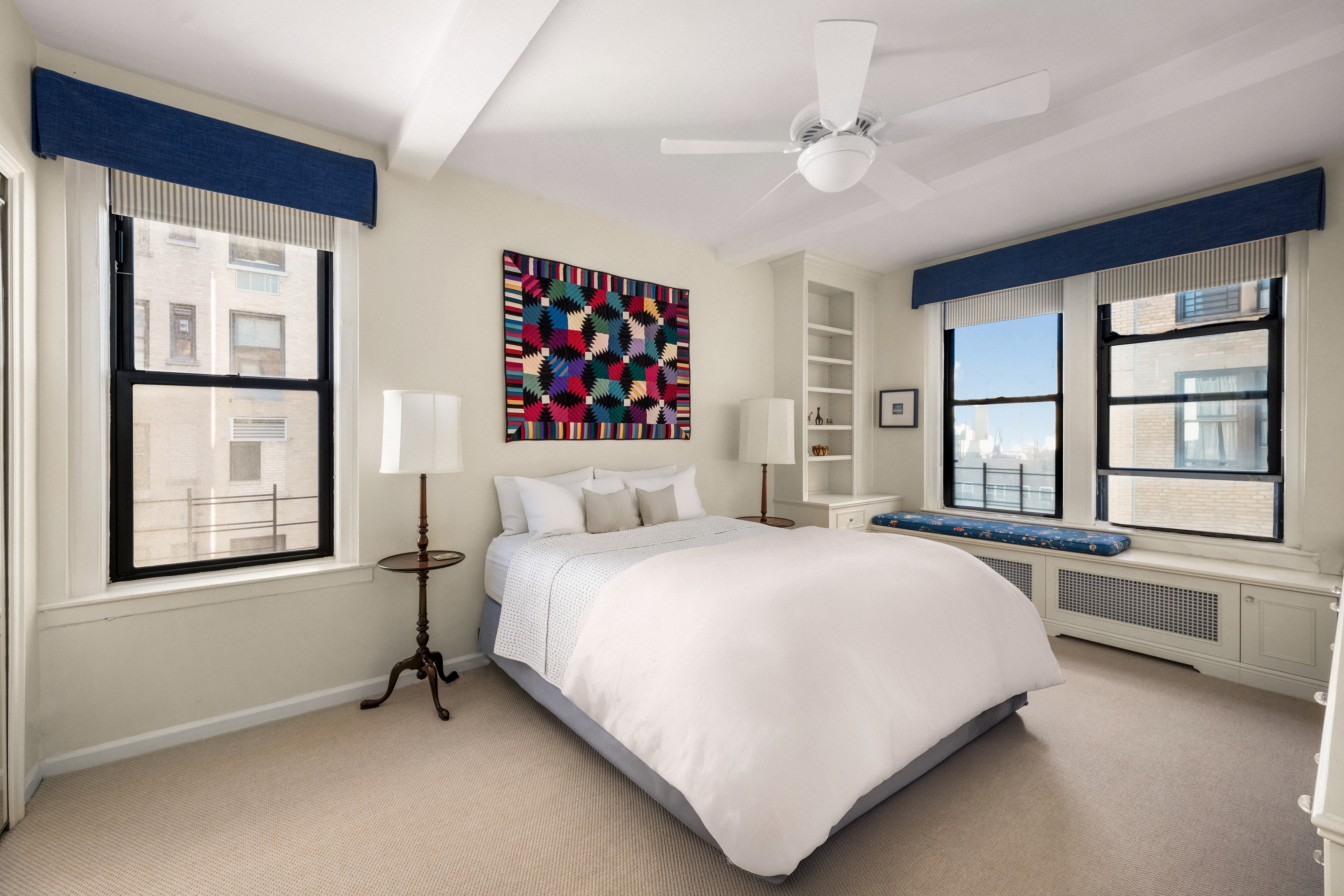 33 Riverside Drive, Unit 13AB Manhattan, NY 10023 - Photo 12 of 19 a bedroom with a bed a dresser next to a window