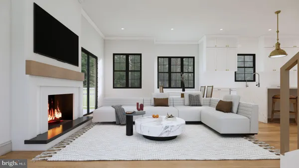 a living room with furniture fireplace and flat screen tv