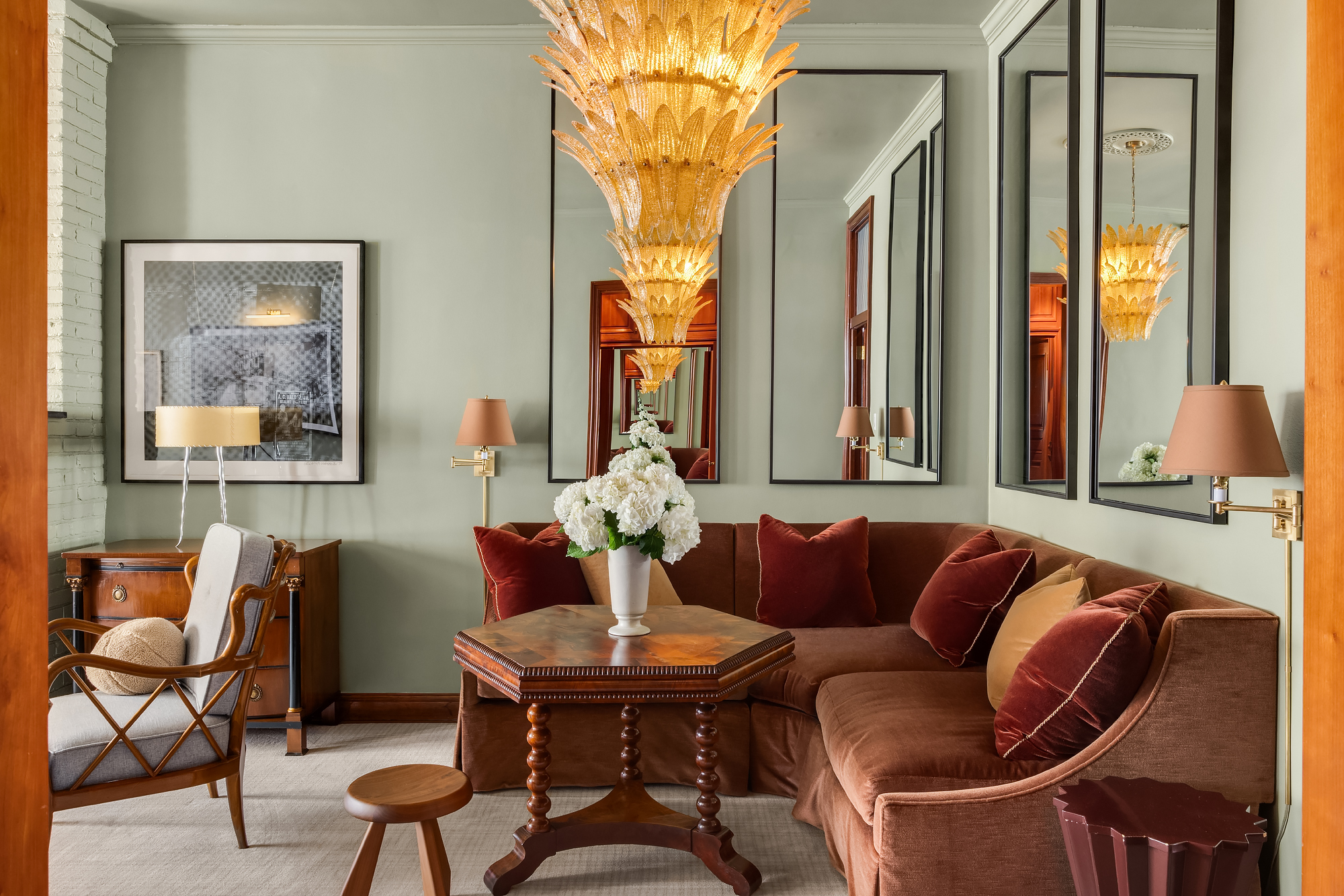 159 West 13th Street Manhattan, NY 10011 - Photo 24 of 36 a living room with furniture and a large window