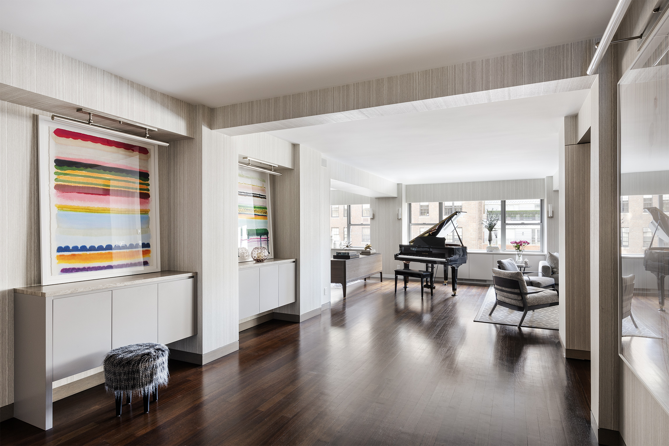 45 East 72nd Street, Unit 9BC Manhattan, NY 10021 - Photo 4 of 16 a living room with furniture and wooden floor