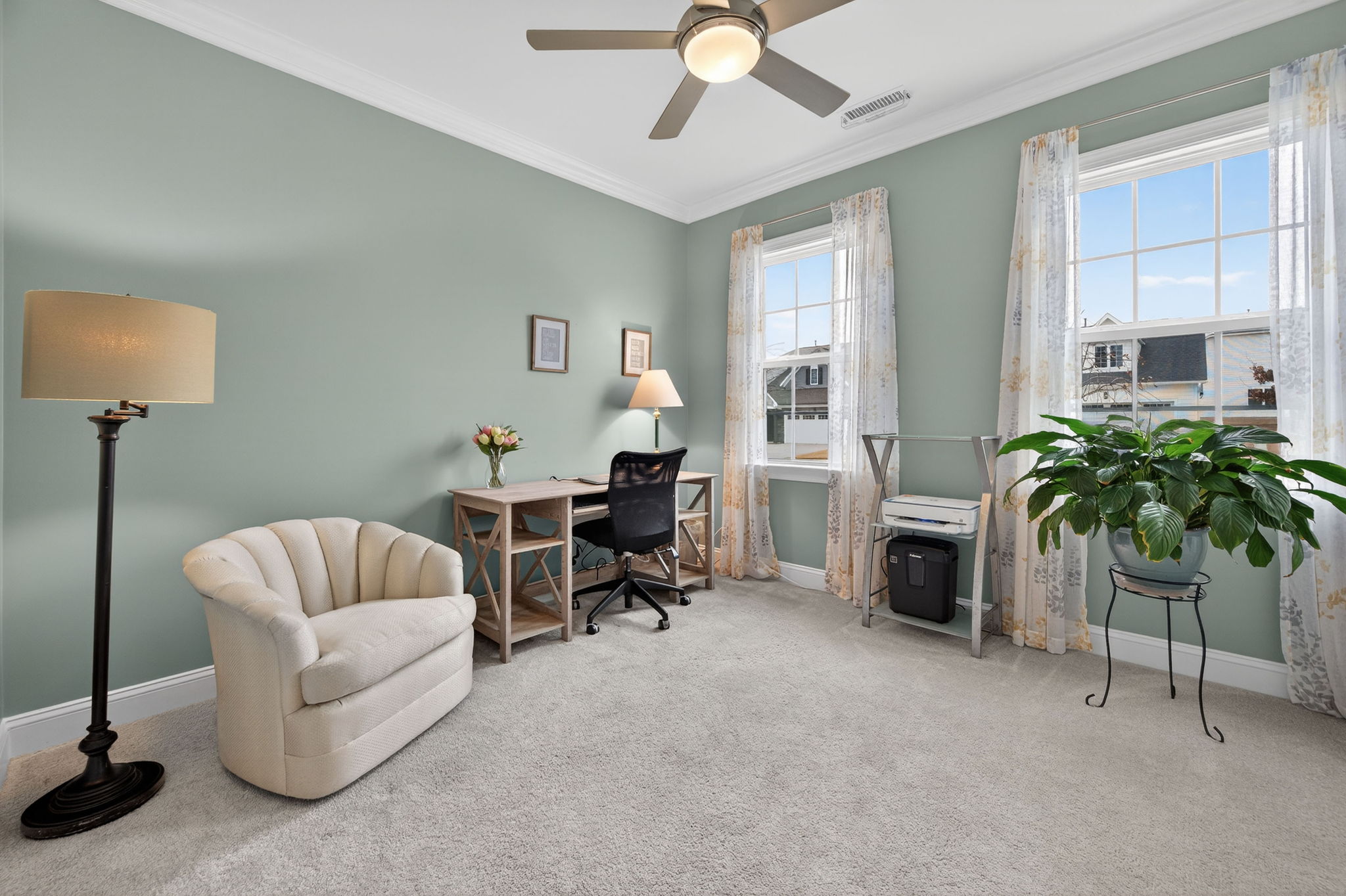 118 Mahogany Run Raleigh, NC 27610 - Photo 33 of 43 a living room with furniture and a potted plant