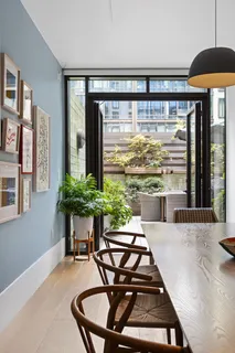 a room with furniture and a large window