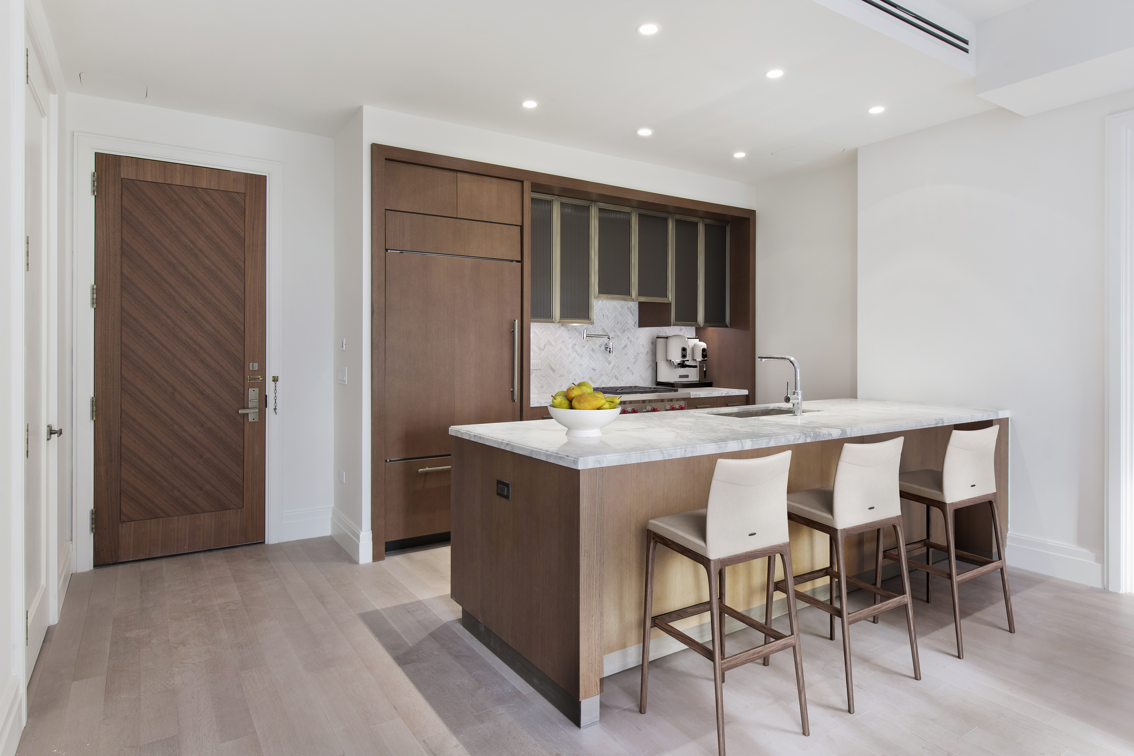 100 Barclay Street, Unit 13P Manhattan, NY 10007 - Photo 3 of 21 a kitchen with a table and chairs