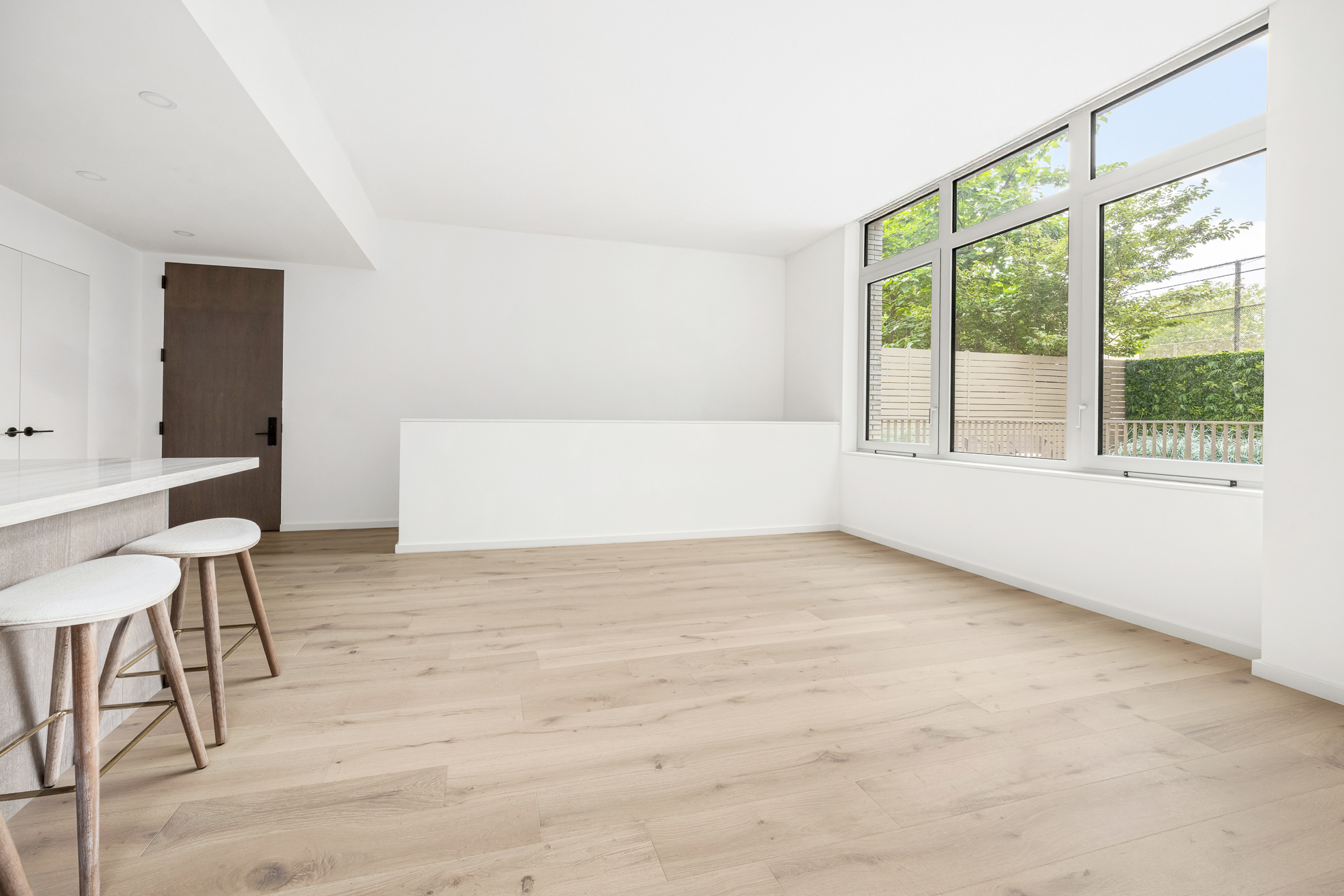 66 Clinton Street, Unit 1A Manhattan, NY 10002 - Photo 2 of 20 a view of an empty room with a window
