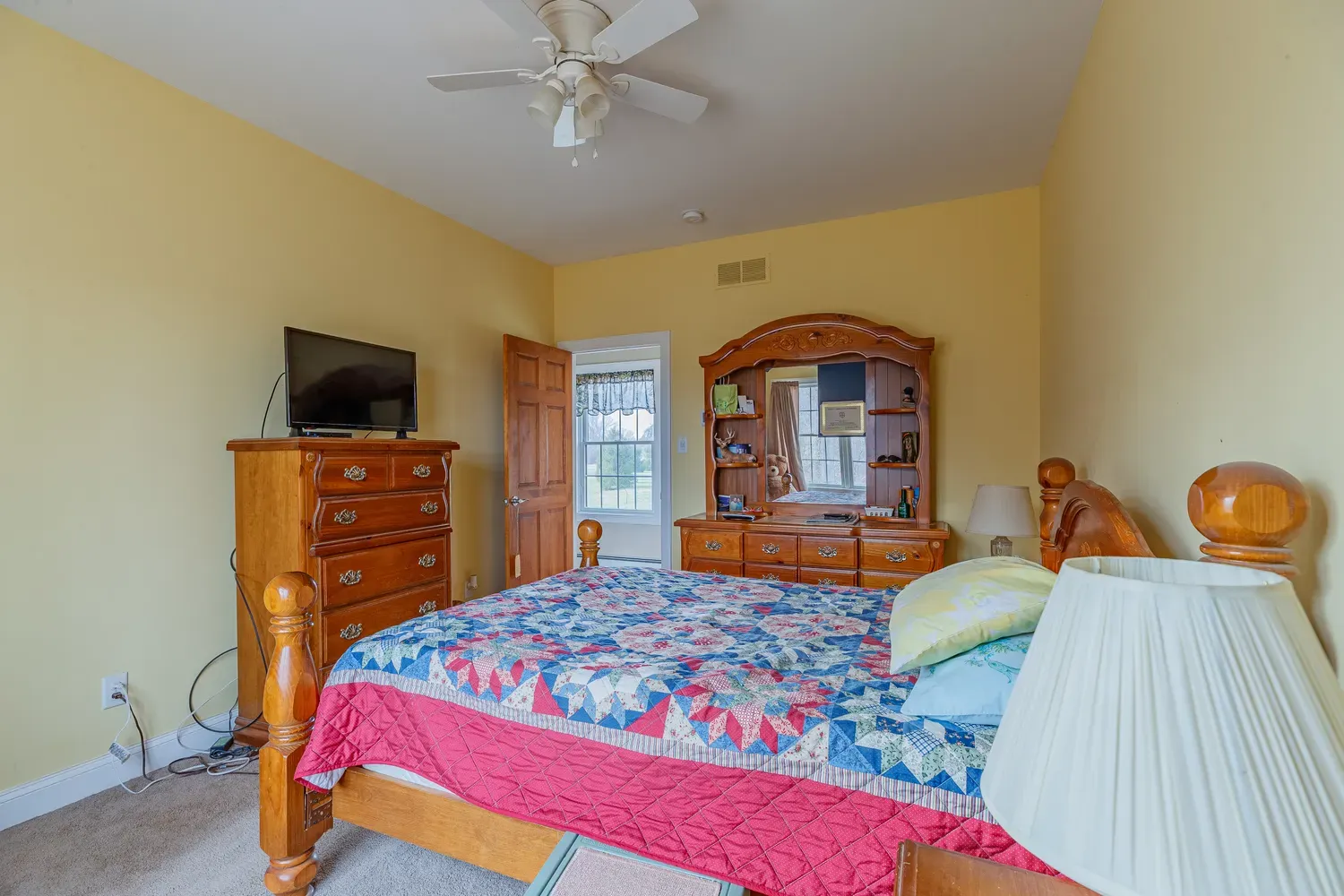 a bedroom with a bed and furniture