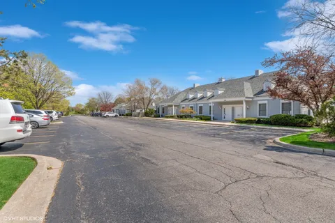a view of street with parked cars