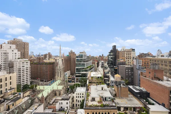 a view of a city with tall buildings