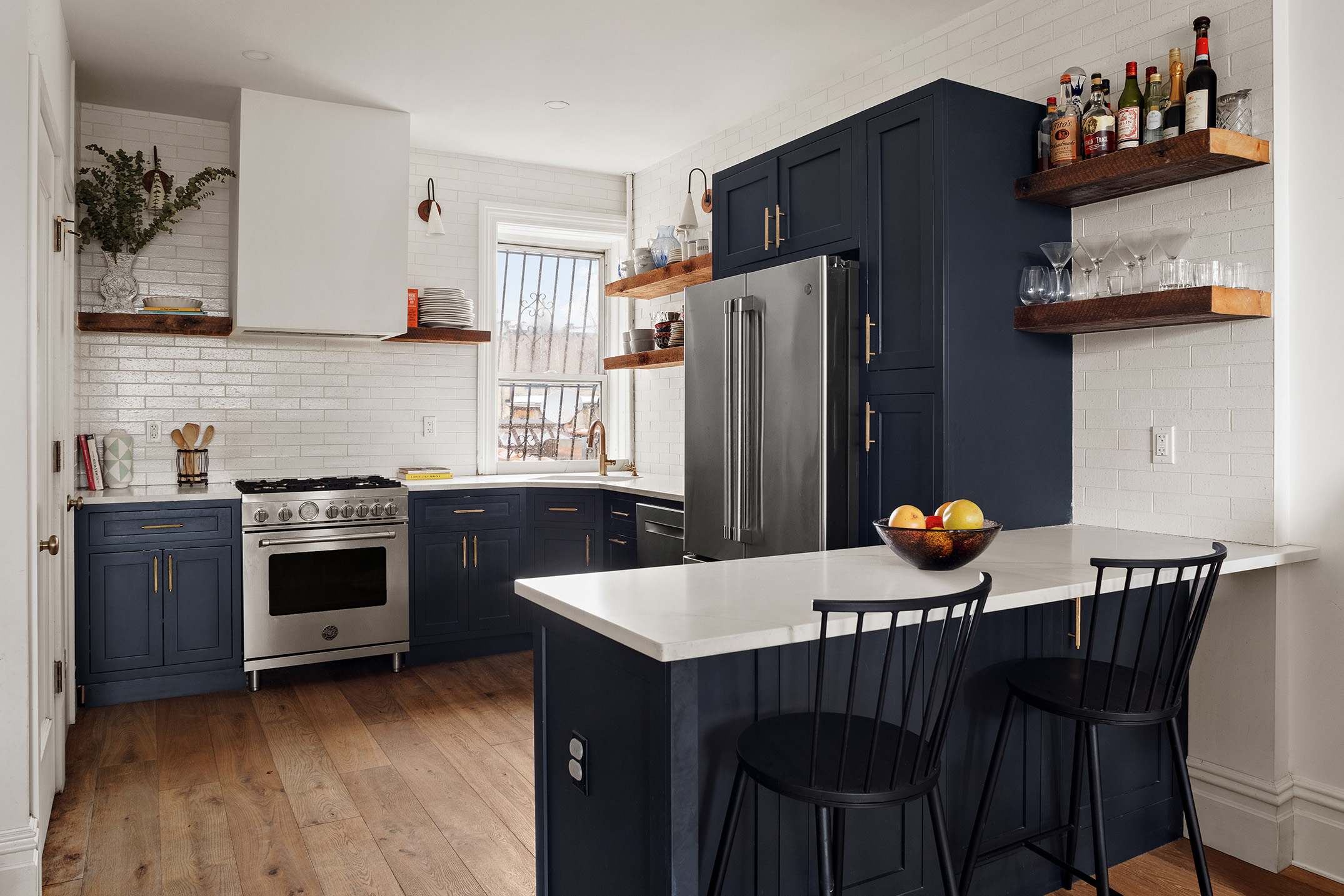 541 8th Street, Unit 3R Brooklyn, NY 11215 - Photo 3 of 9 a kitchen with stainless steel appliances a stove a sink a refrigerator and a dining table