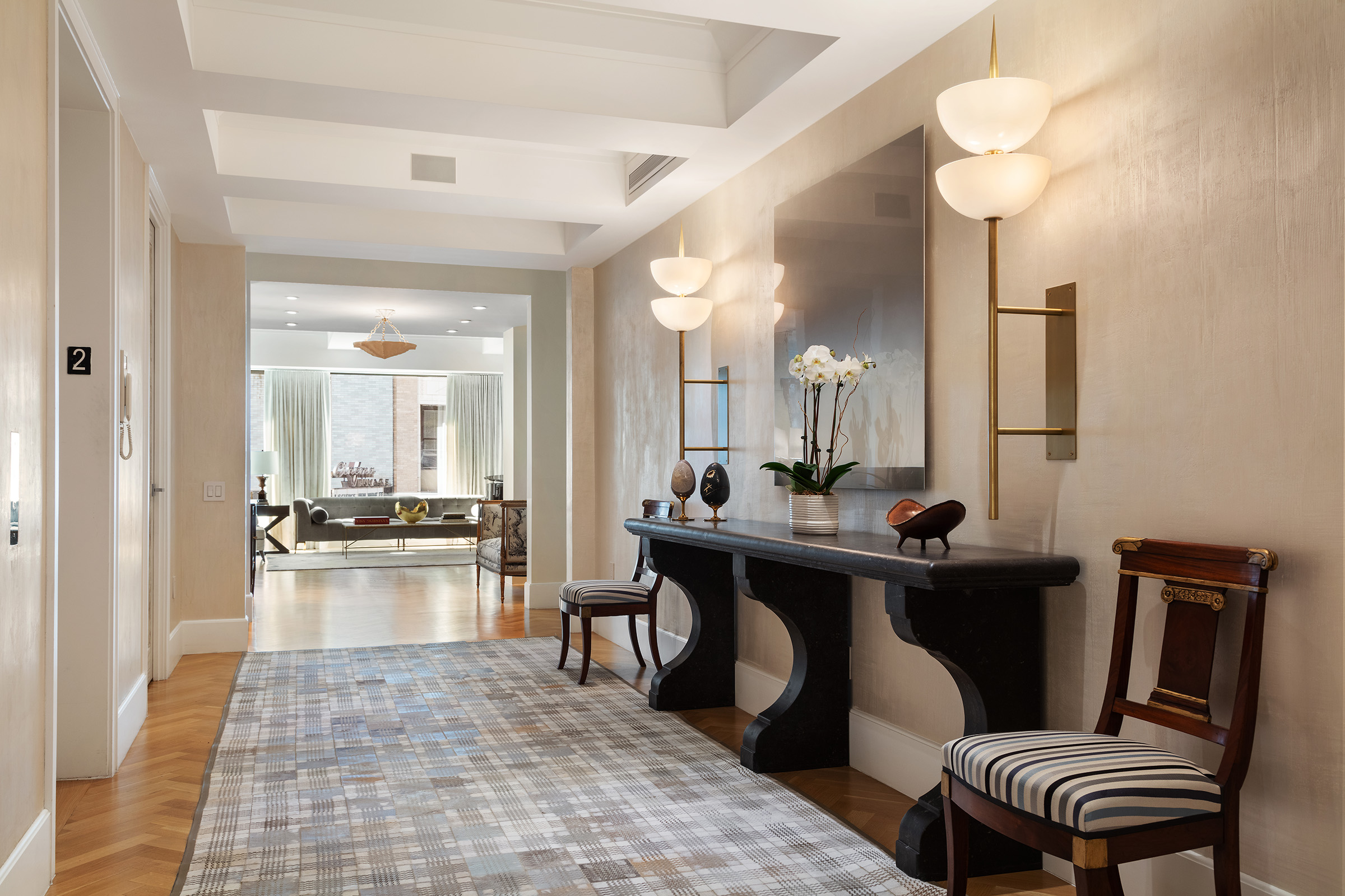 17 East 12th Street, Unit 2 Manhattan, NY 10003 - Photo 5 of 19 a bathroom with a sink a mirror and a bathtub