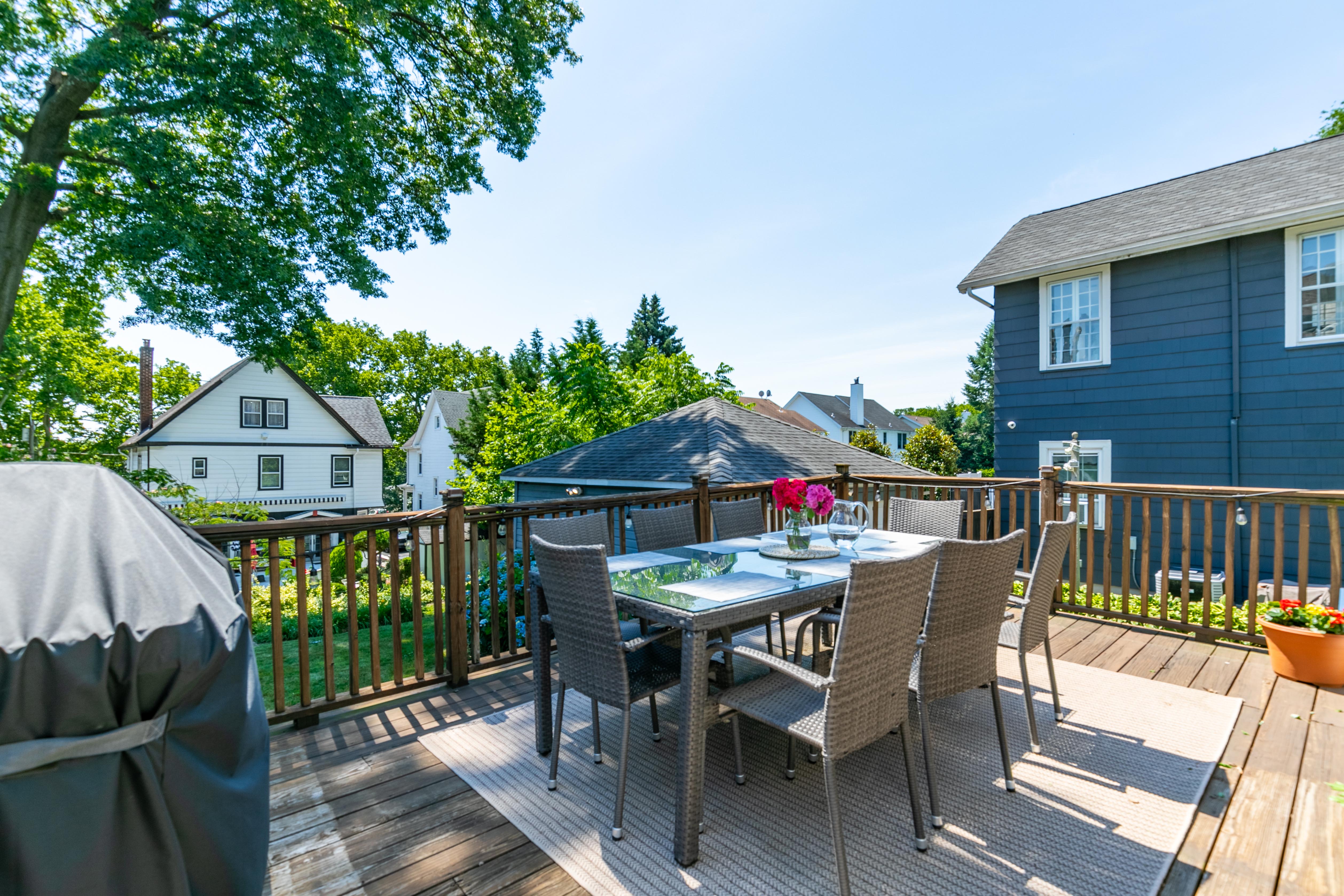 163 Ridge Road Rutherford, NJ 07070 - Photo 42 of 59 a view of a chairs and table in the roof deck