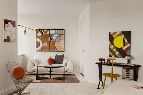 a bathroom with a sink a mirror and a shower