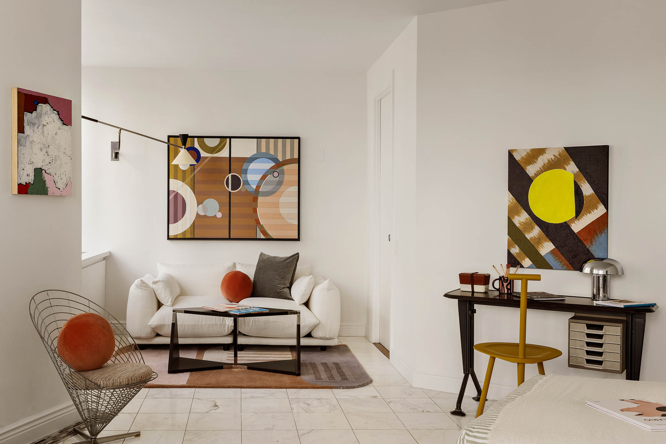 295 Greenwich Street, Unit 8/9H Manhattan, NY 10007 - Photo 14 of 22 a living room with furniture and a mirror