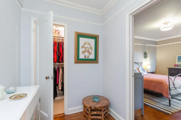 a bedroom with furniture and a window
