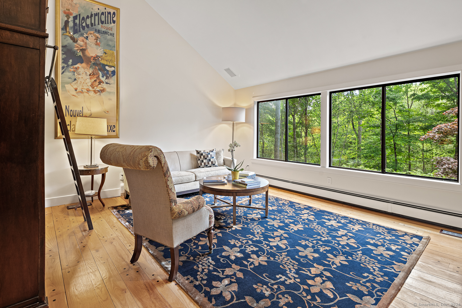 13 Bittersweet Road Weston, CT 06883 - Photo 4 of 35 a living room with furniture and a rug