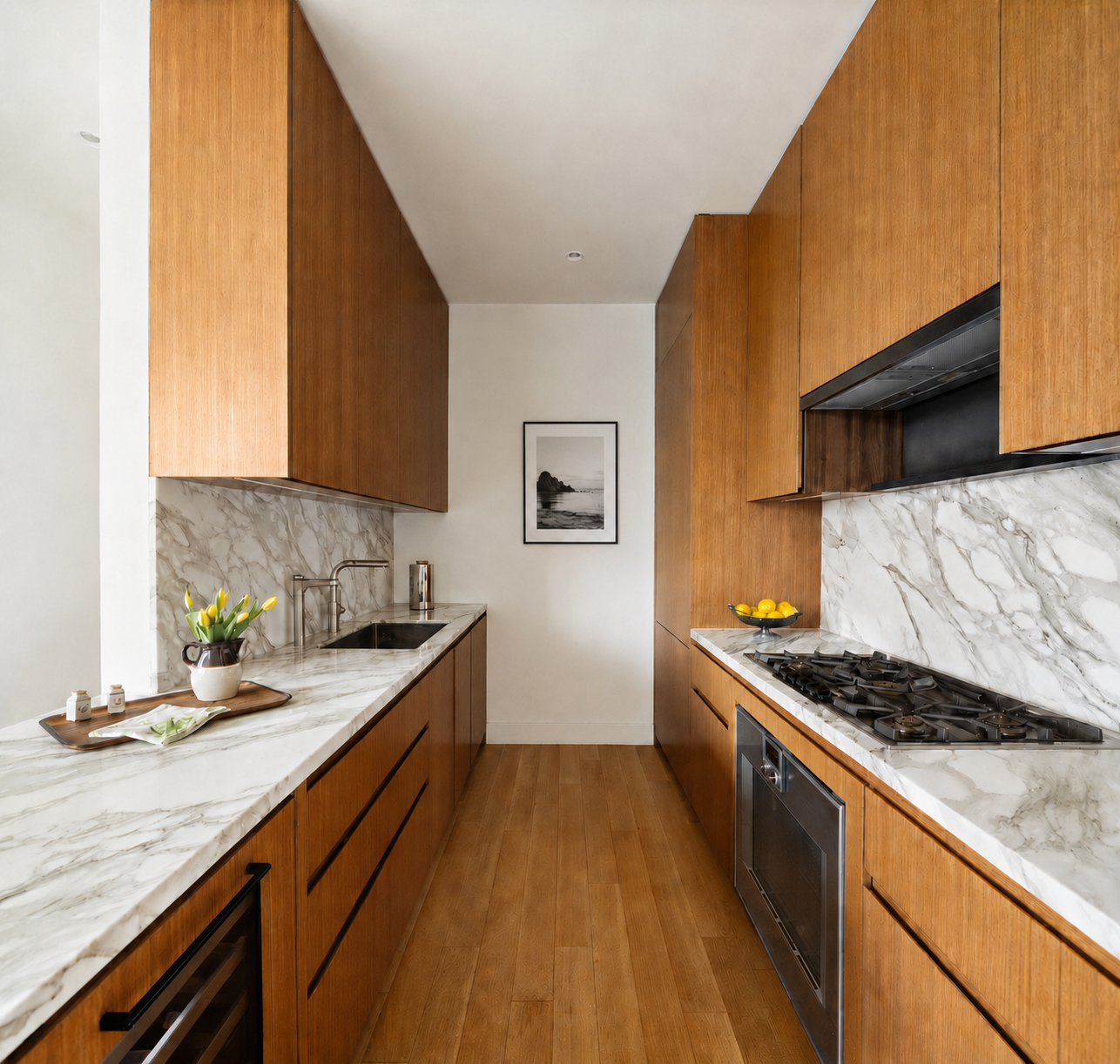 15 East 30th Street, Unit 26C Manhattan, NY 10016 - Photo 3 of 15 a kitchen with stainless steel appliances granite countertop a sink stove and cabinets