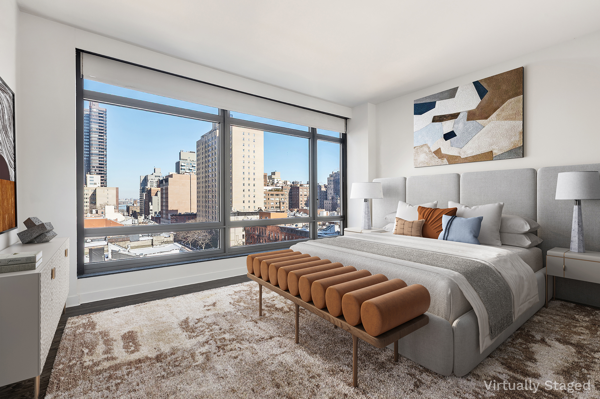 450 East 83rd Street, Unit 8B Manhattan, NY 10028 - Photo 7 of 22 a bedroom with a bed and glass walk in closet