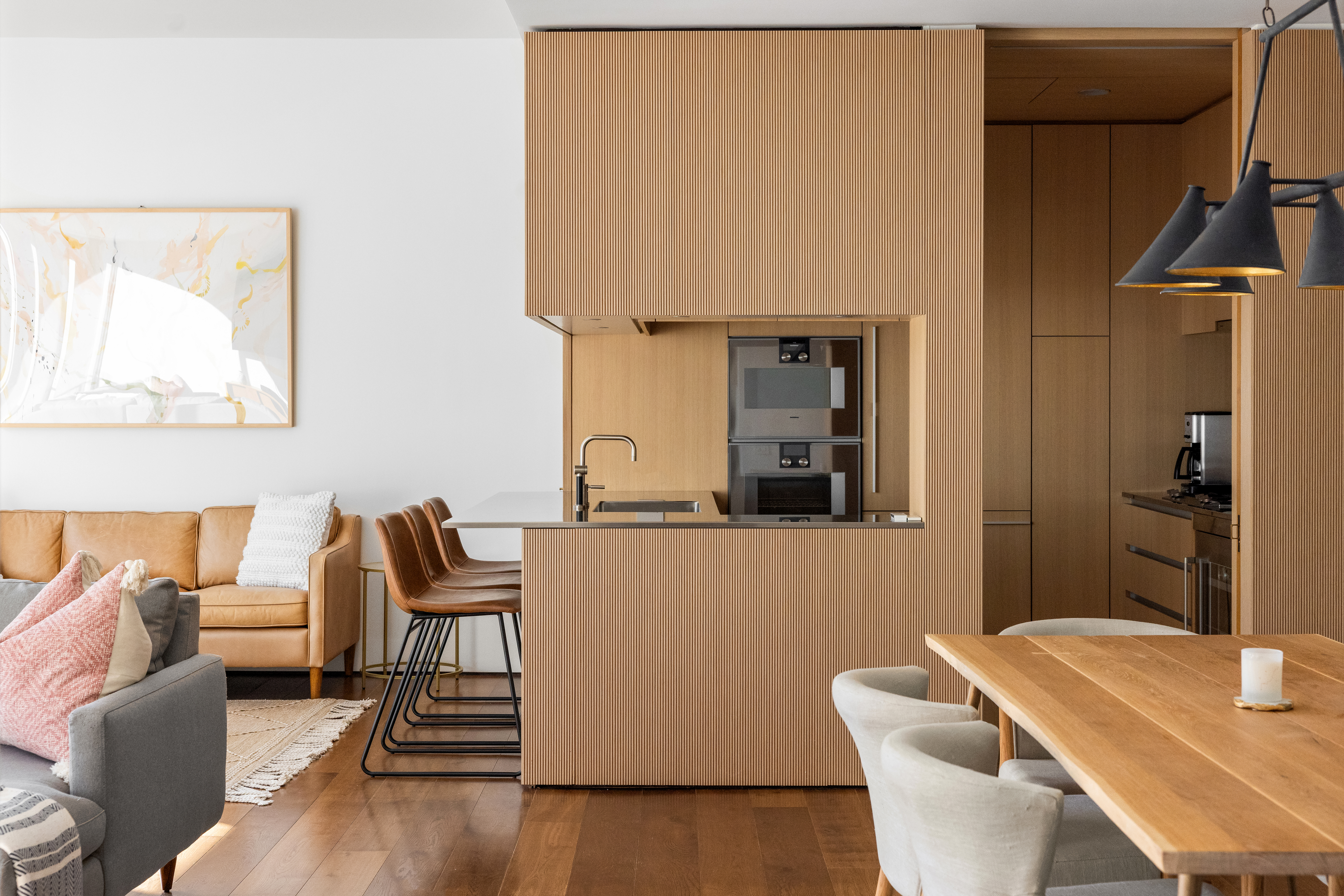 527 West 27th Street, Unit 4C Manhattan, NY 10001 - Photo 8 of 25 a living room with furniture and a table