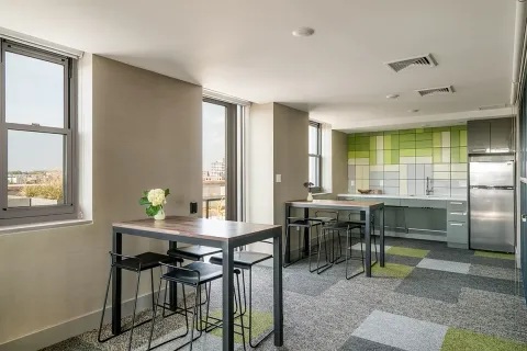 a view of a dining room with furniture