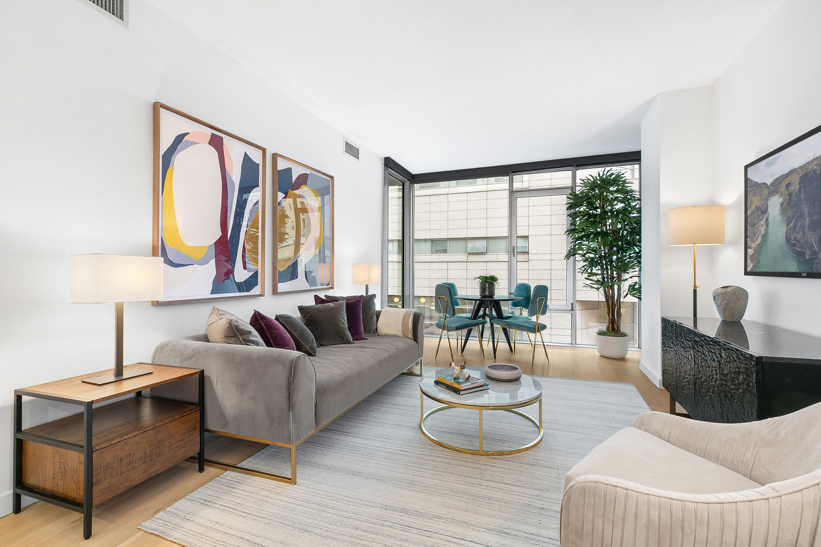 50 Franklin Street, Unit 9A Manhattan, NY 10013 - Photo 1 of 7 a living room with furniture and a large window