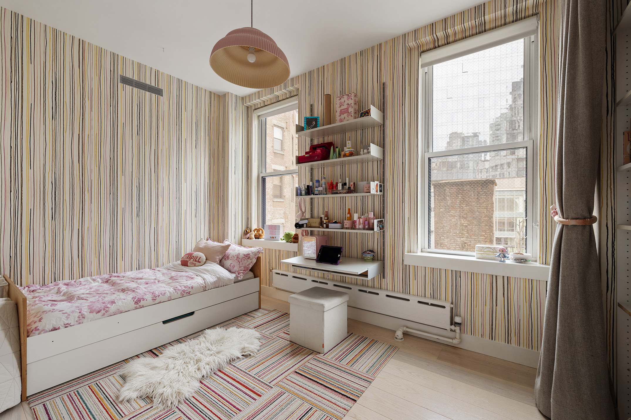 24 West 30th Street, Unit 7F Manhattan, NY 10001 - Photo 11 of 13 a bedroom with furniture and a window