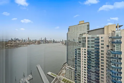 a view of a city with tall buildings