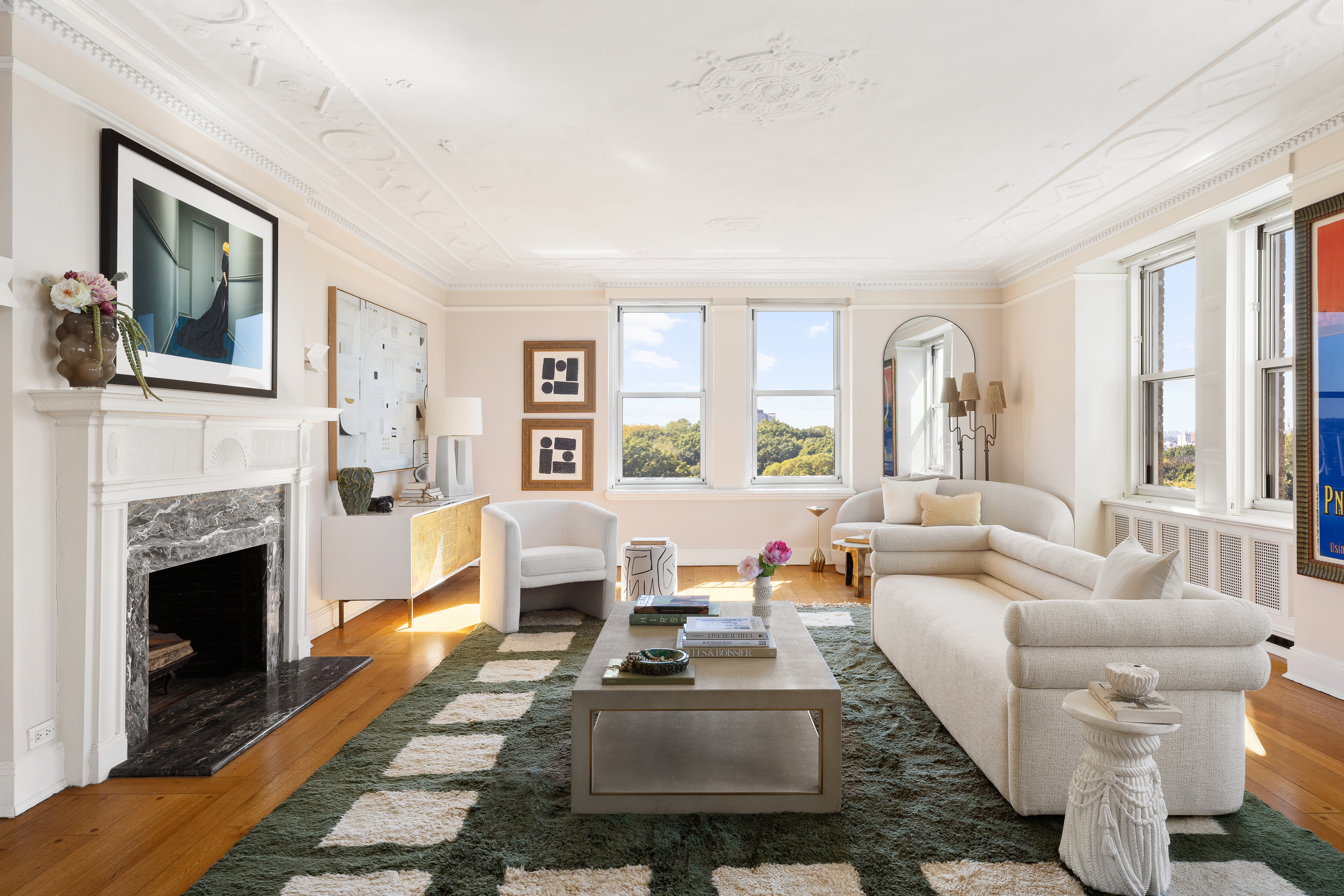 35 Prospect Park West, Unit 10B Brooklyn, NY 11215 - Photo 2 of 19 a living room with furniture large window and fireplace