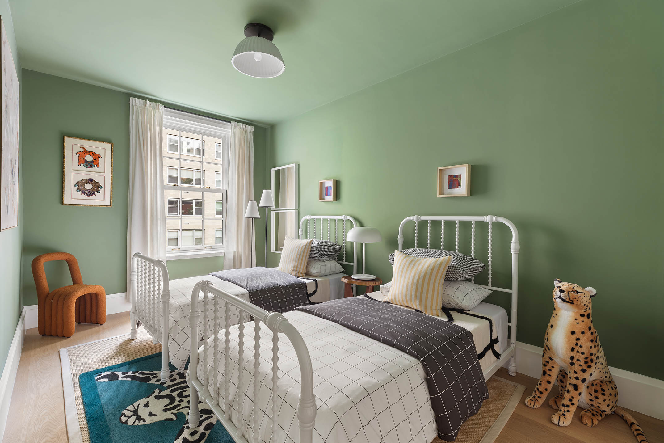 17 East 9th Street Manhattan, NY 10003 - Photo 21 of 32 a bedroom with a bed and a window