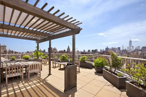 a view of roof deck with a barbeque